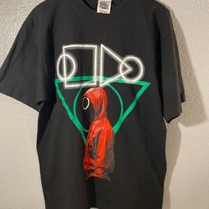 Black Graphic T-Shirt with Red and Green Accents squid games